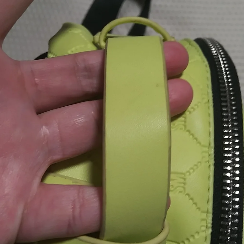 Steve madden neon backpack.